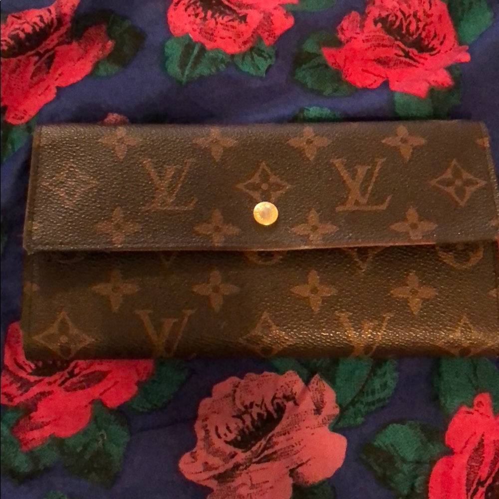 Vintage Louis Vuitton wallet.